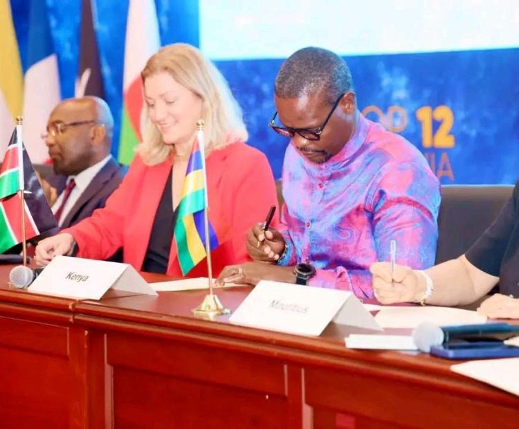 Environment PS Dr. Eng Festus Ngéno signs the Nairobi Convention Protocol on Marine and Coastal Biological Diversity and Protected Areas during COP12 in Dar es Salaam, Tanzania